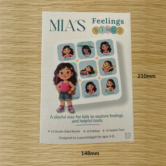Mia's Feelings Bingo game for emotional literacy on a wooden surface with measurements.