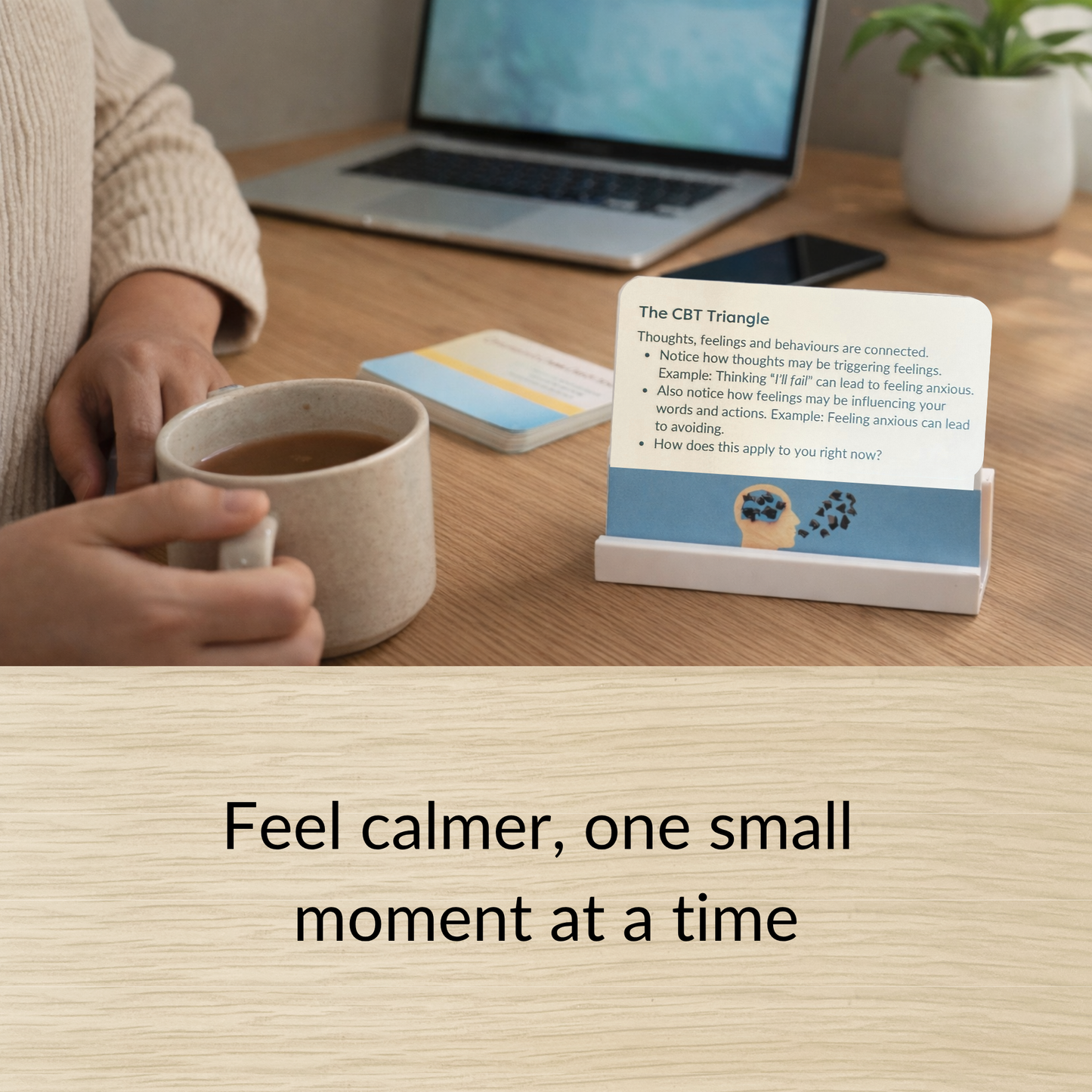 calm cards placed on a desk with tea creating a peaceful moment for managing stress and finding calm