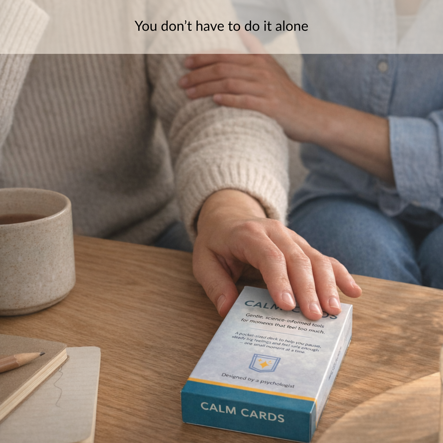 person offering support while using calm cards during an overwhelming moment to help regulate emotions