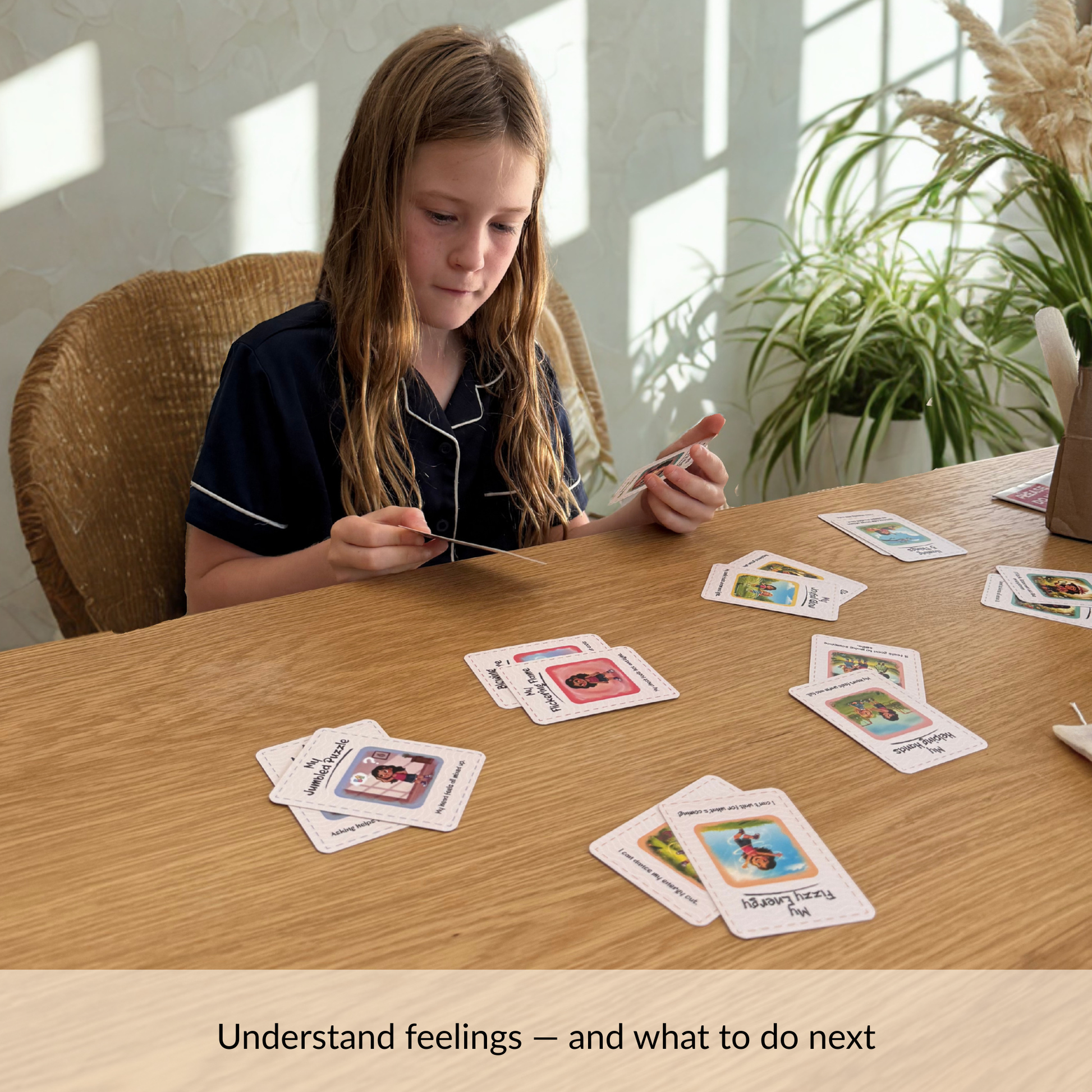 child using Mia emotion cards to recognise feelings and learn emotional regulation strategies